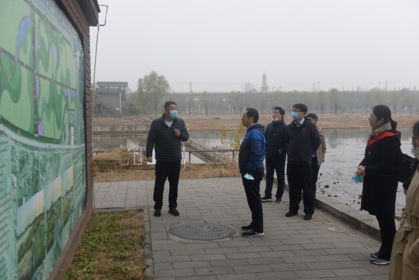 公司与水利部人事司党支部结合发展 “关爱山水河道”主题党日活动